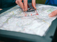Using a compass with map in a case