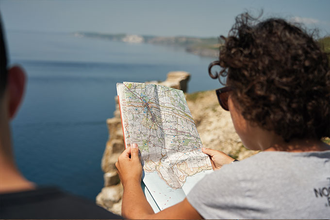 Woman reading map